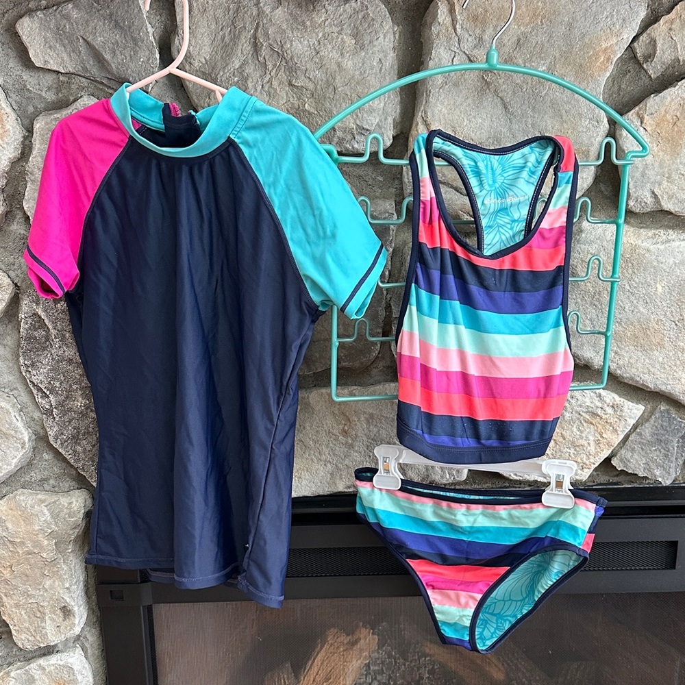 Reversible girls, two-piece bathing suit w/coordinating short sleeve rash guard